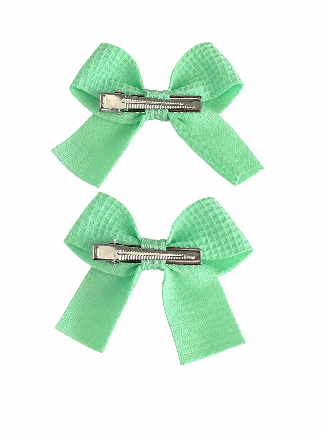 Moño par niña verde menta con textura