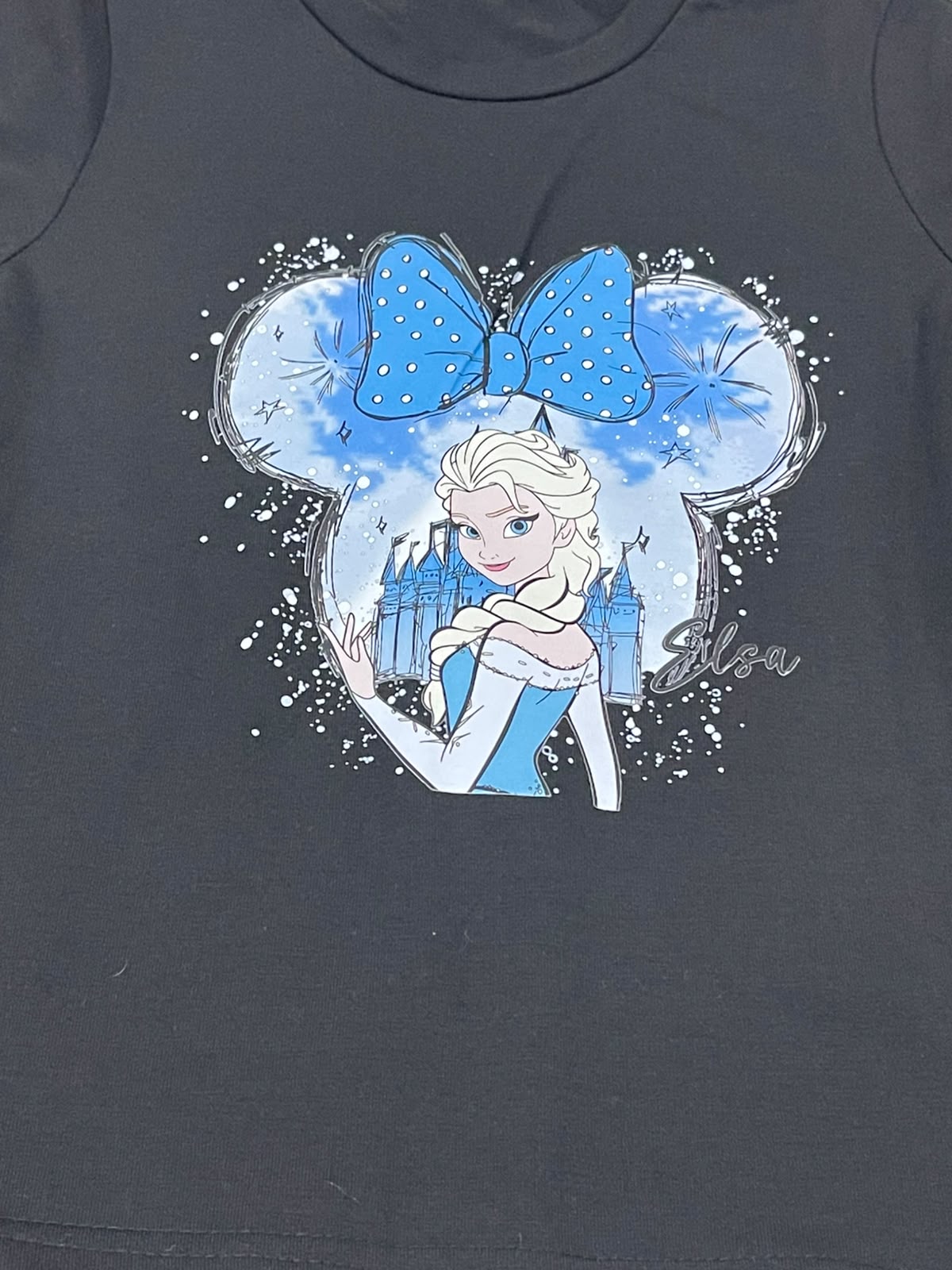 Blusa niña negré con estampado de princesa de hielo