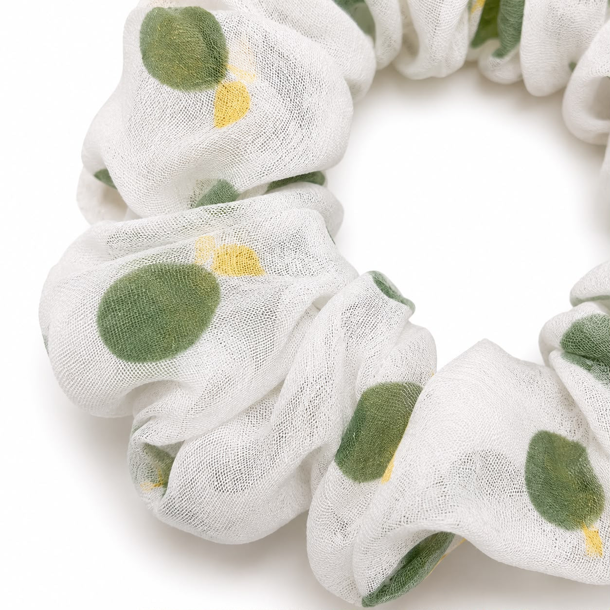 Liga cabello accesorio con puntos verdes