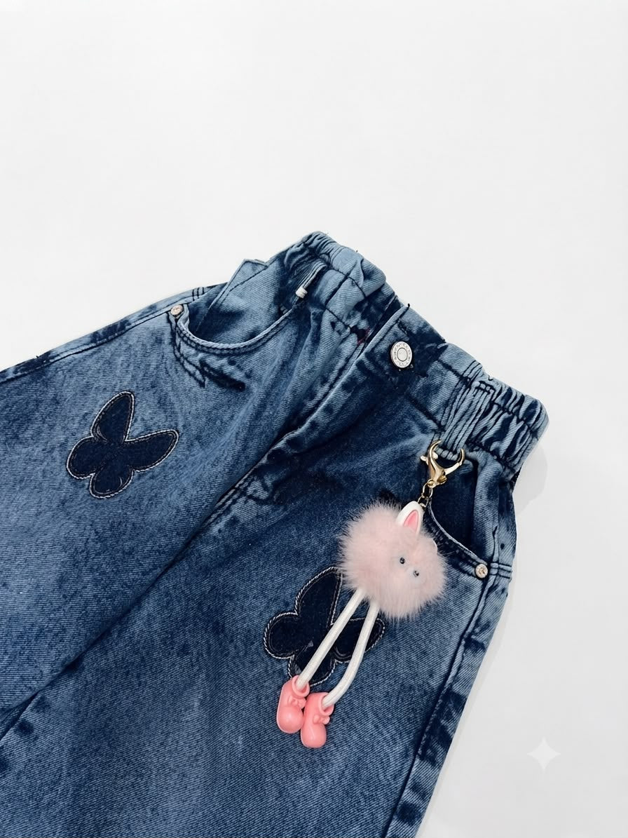 Pantalón niña de mezclilla wide leg con mariposas
