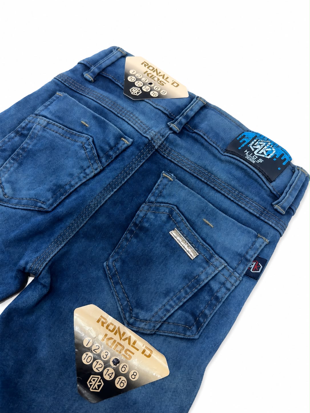 Pantalón niño mezclilla azul con efecto deslavado