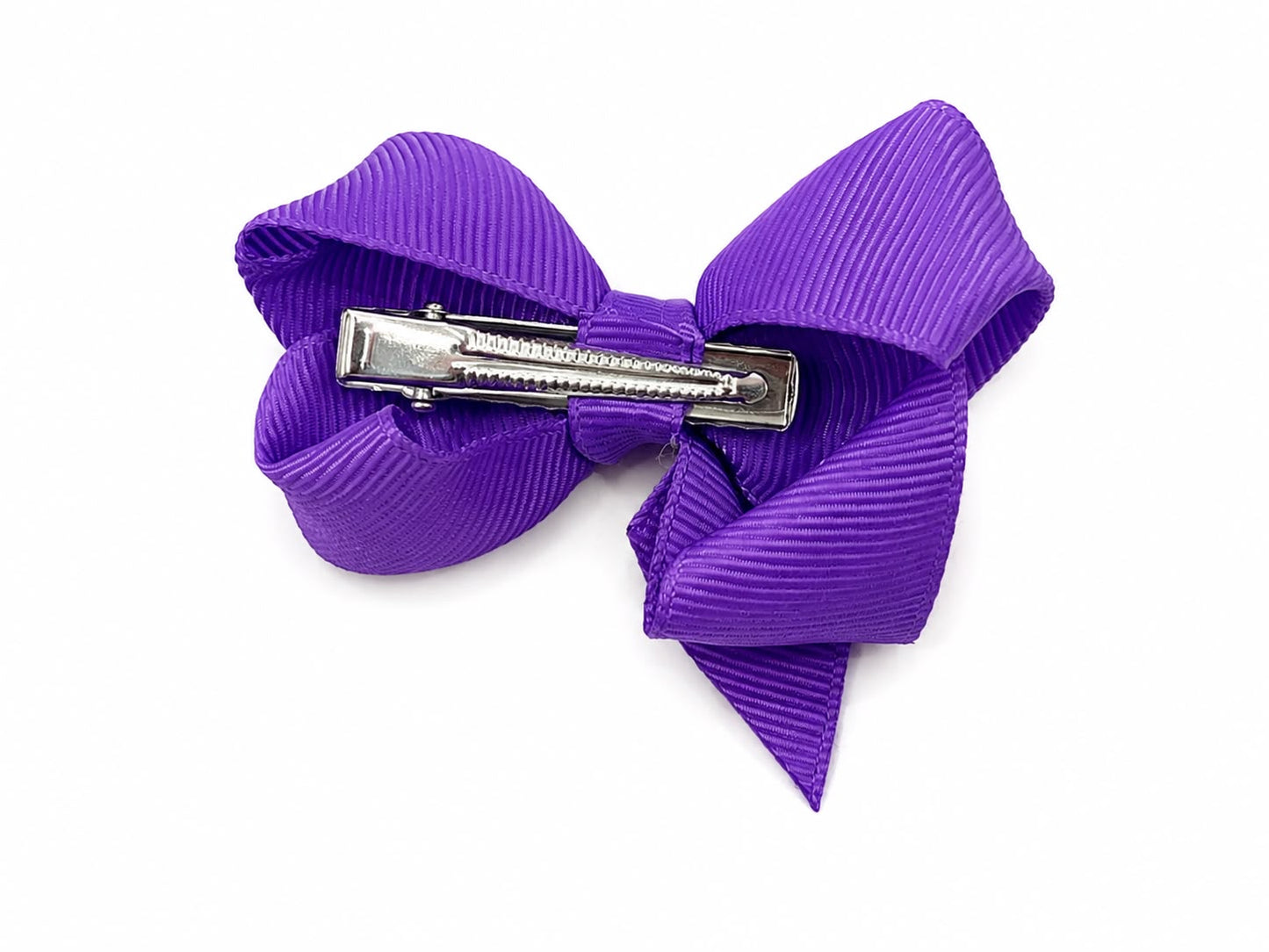 Moño chico niña morado clásico