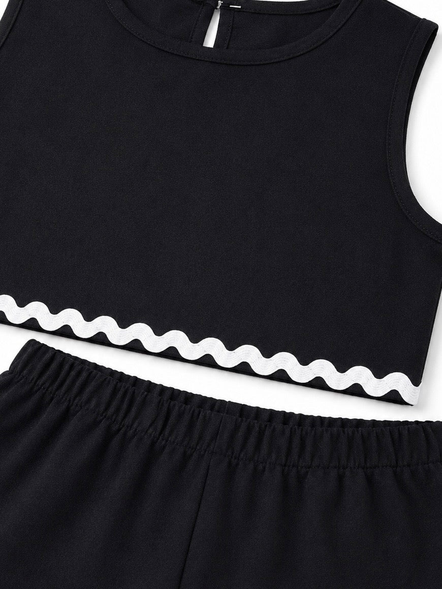 Set niña negro con detalles blancos