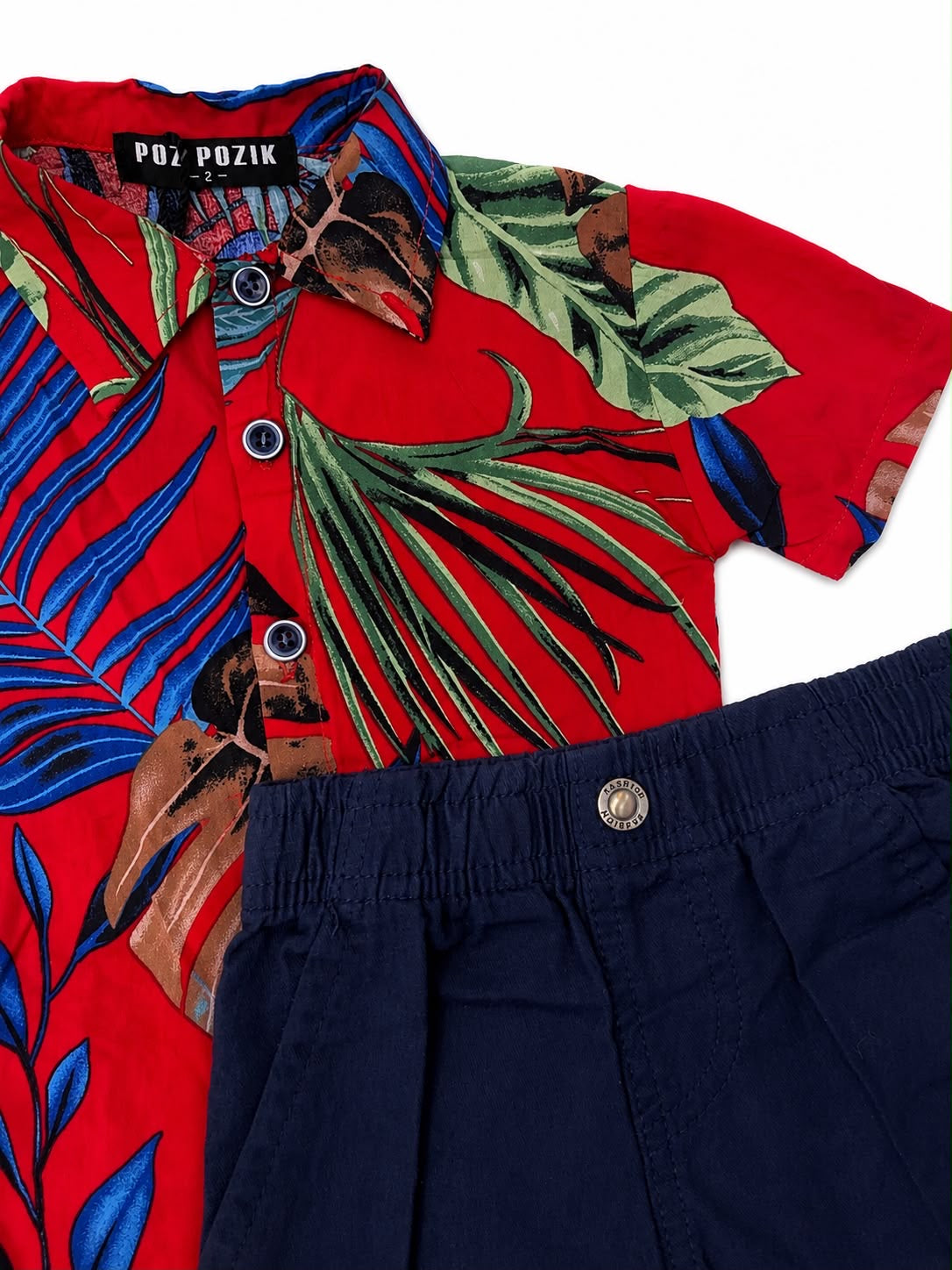 Set niño camisa tropical roja con short azul marino