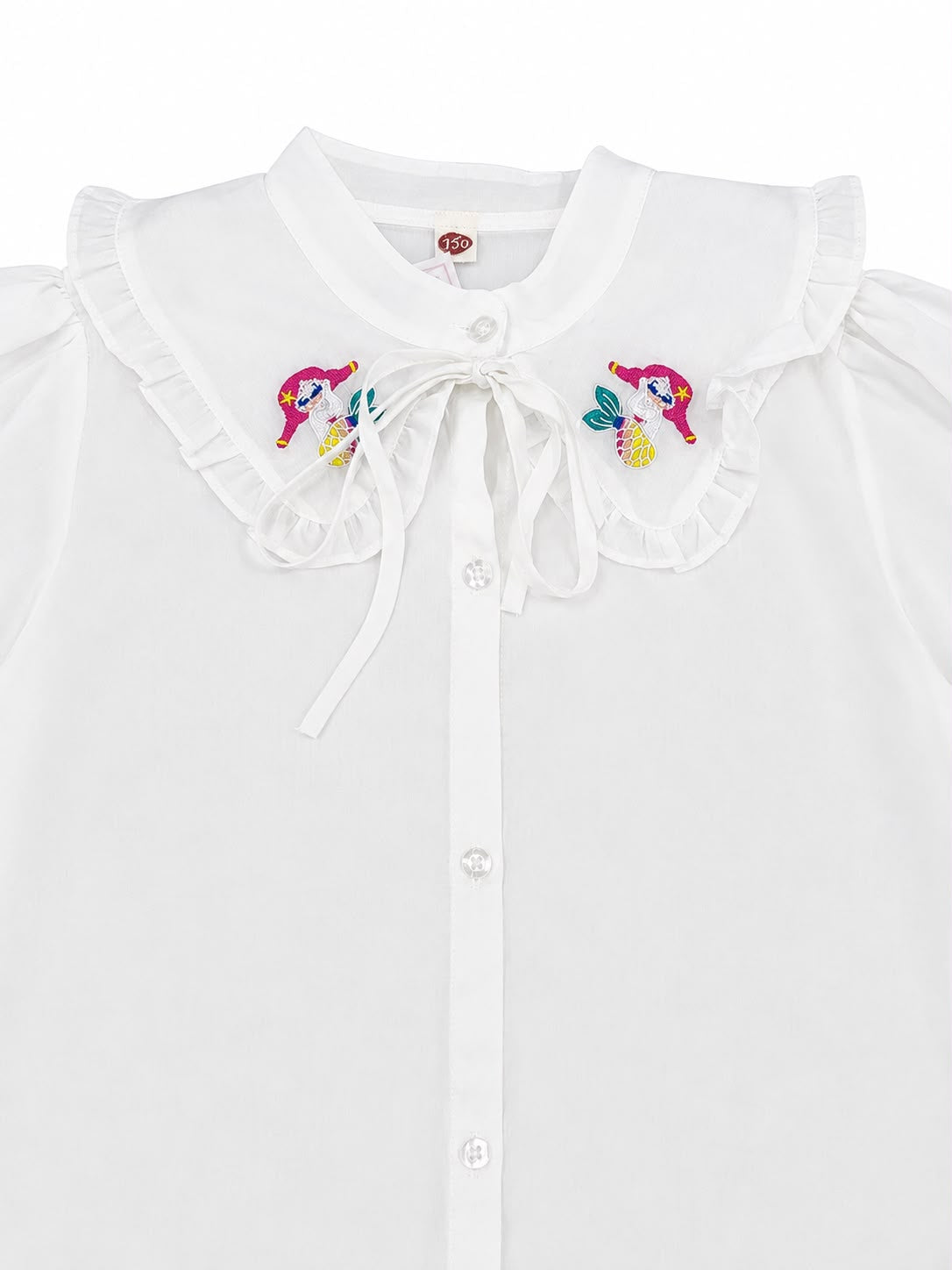 Blusa niña blanca con cuello bordado de unicornios
