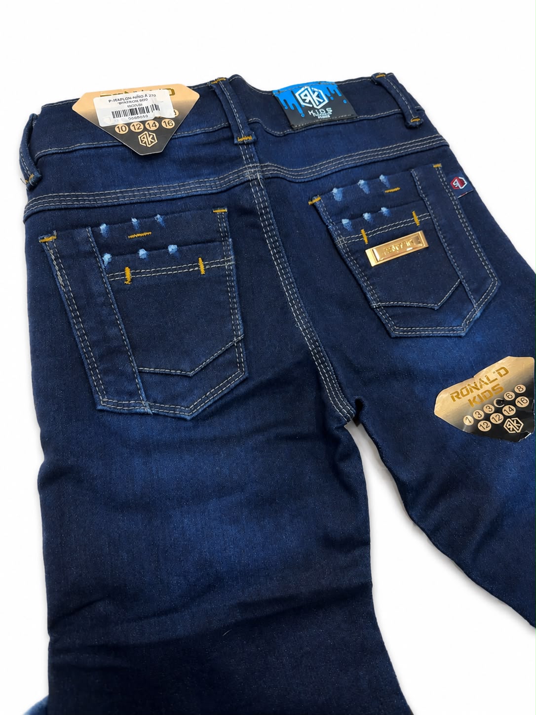 Pantalón niño mezclilla azul oscuro con detalles decorativos