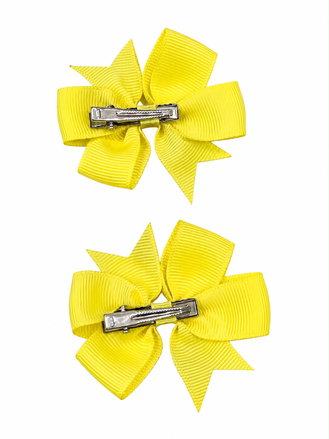 Moño par niña amarillo