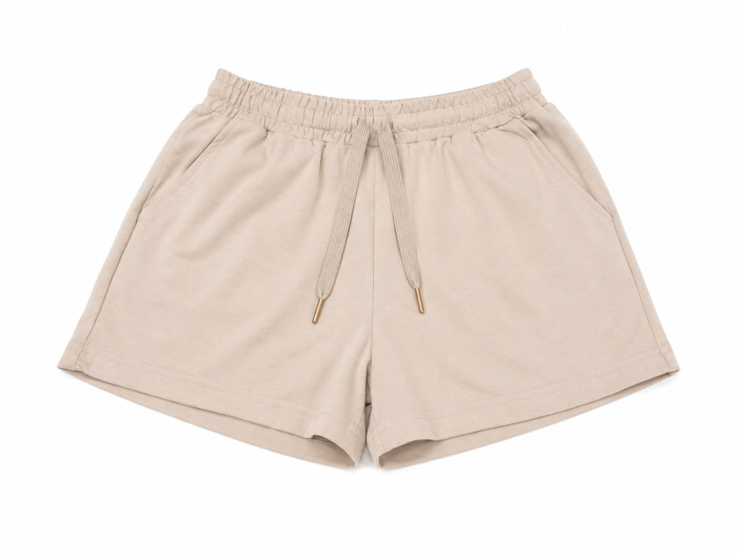 Set niña de playera y short color beige