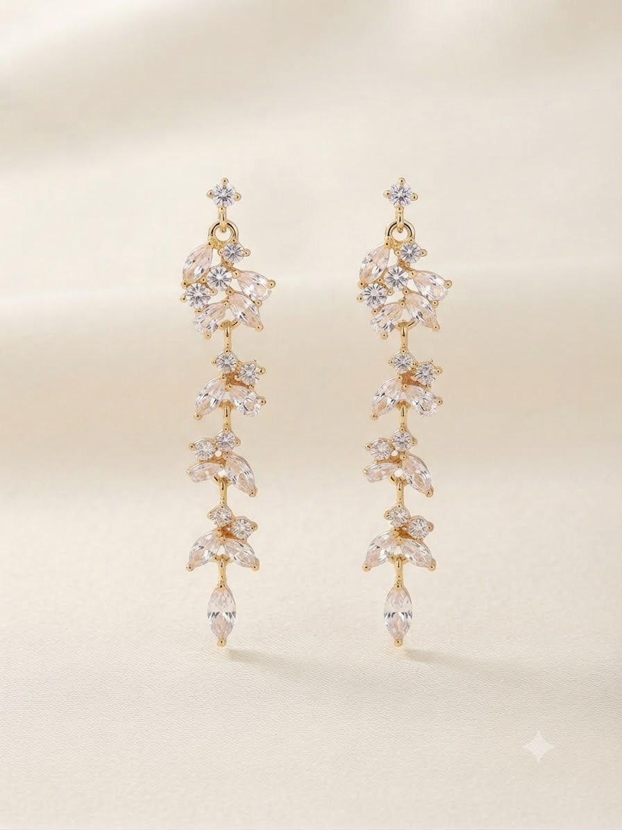 Aretes colgantes dorados con cristales tipo flor