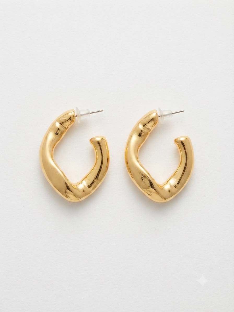 Aretes tipo huggie orgánicos dorados