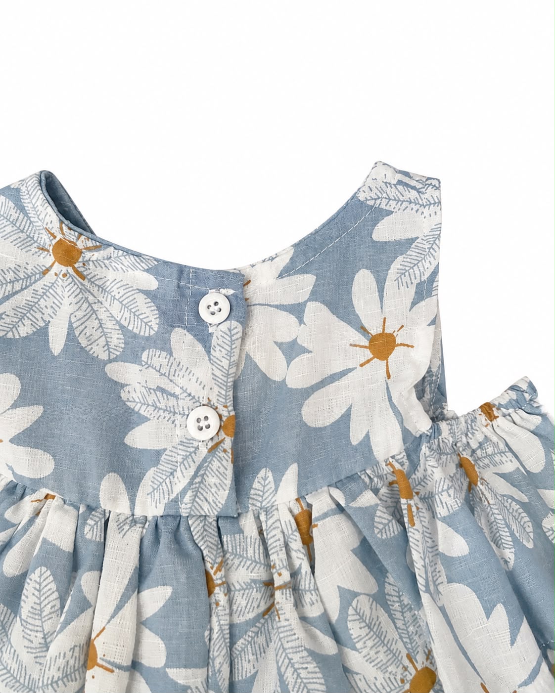 Vestido niña meses azul con estampado de margaritas