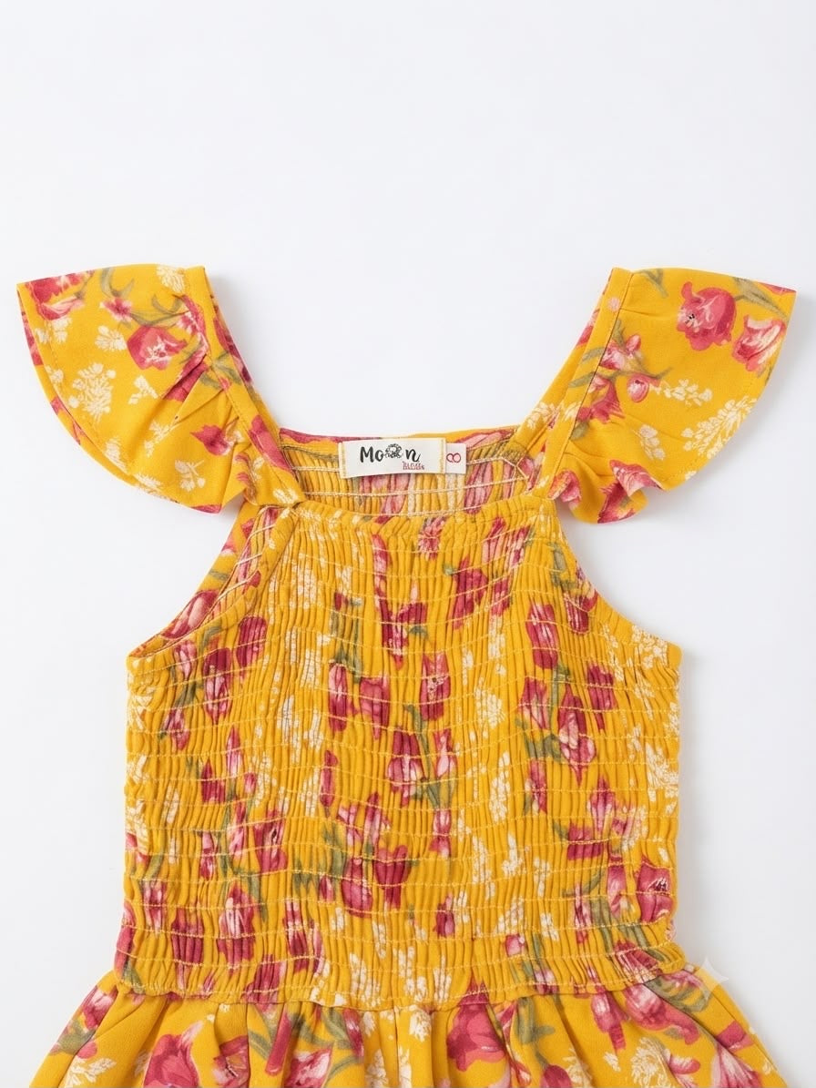 Vestido niña estampado floral amarillo llena de color
