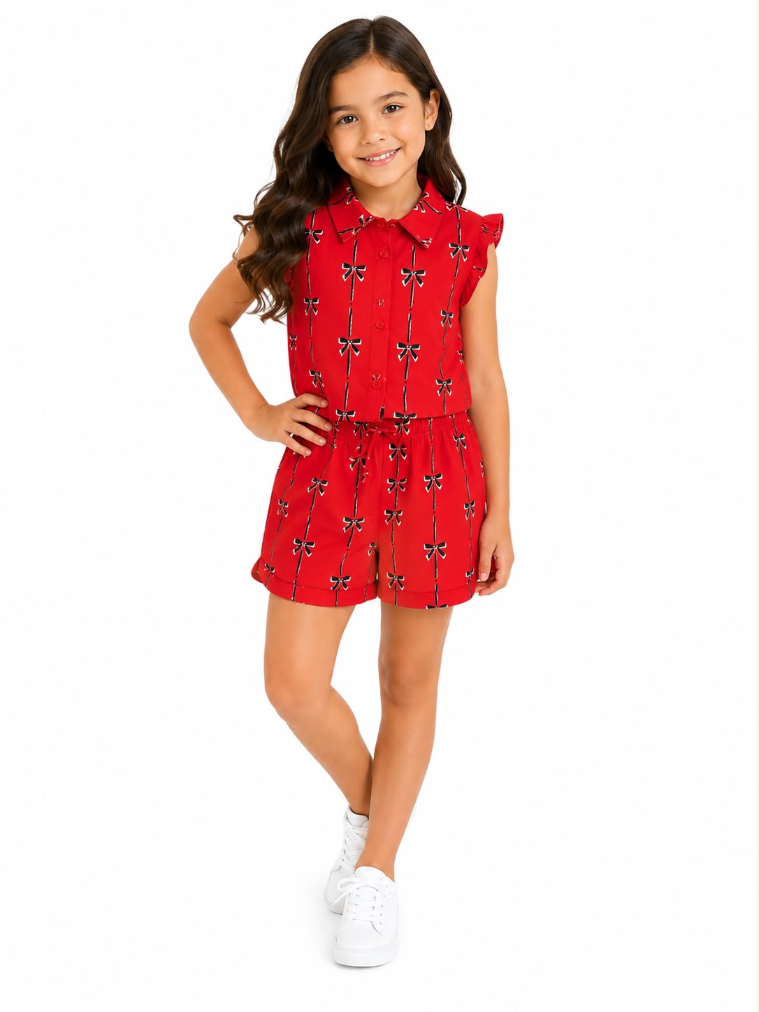 Set niña blusa y short estampado de moñitos