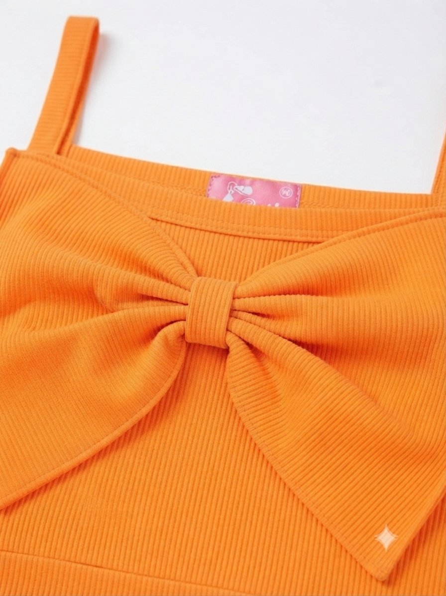 Blusa niña naranja con moño grande