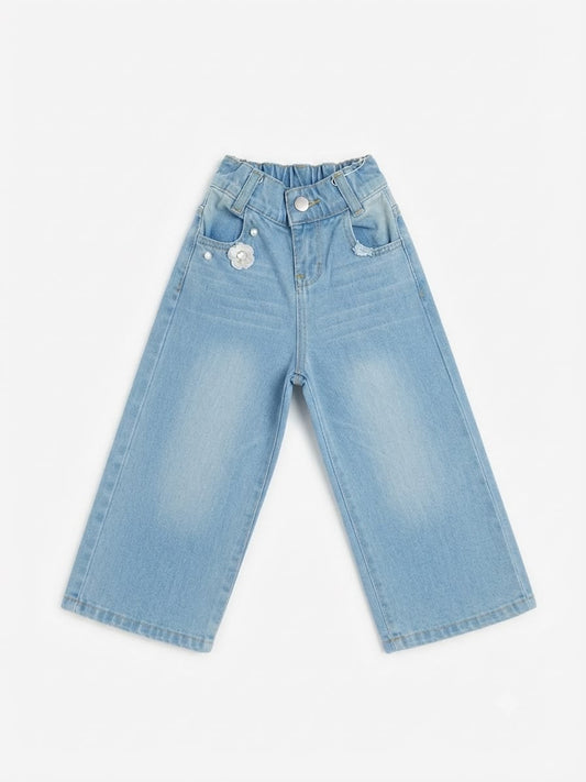 Pantalón Niña mezclilla wide leg flor decorativa