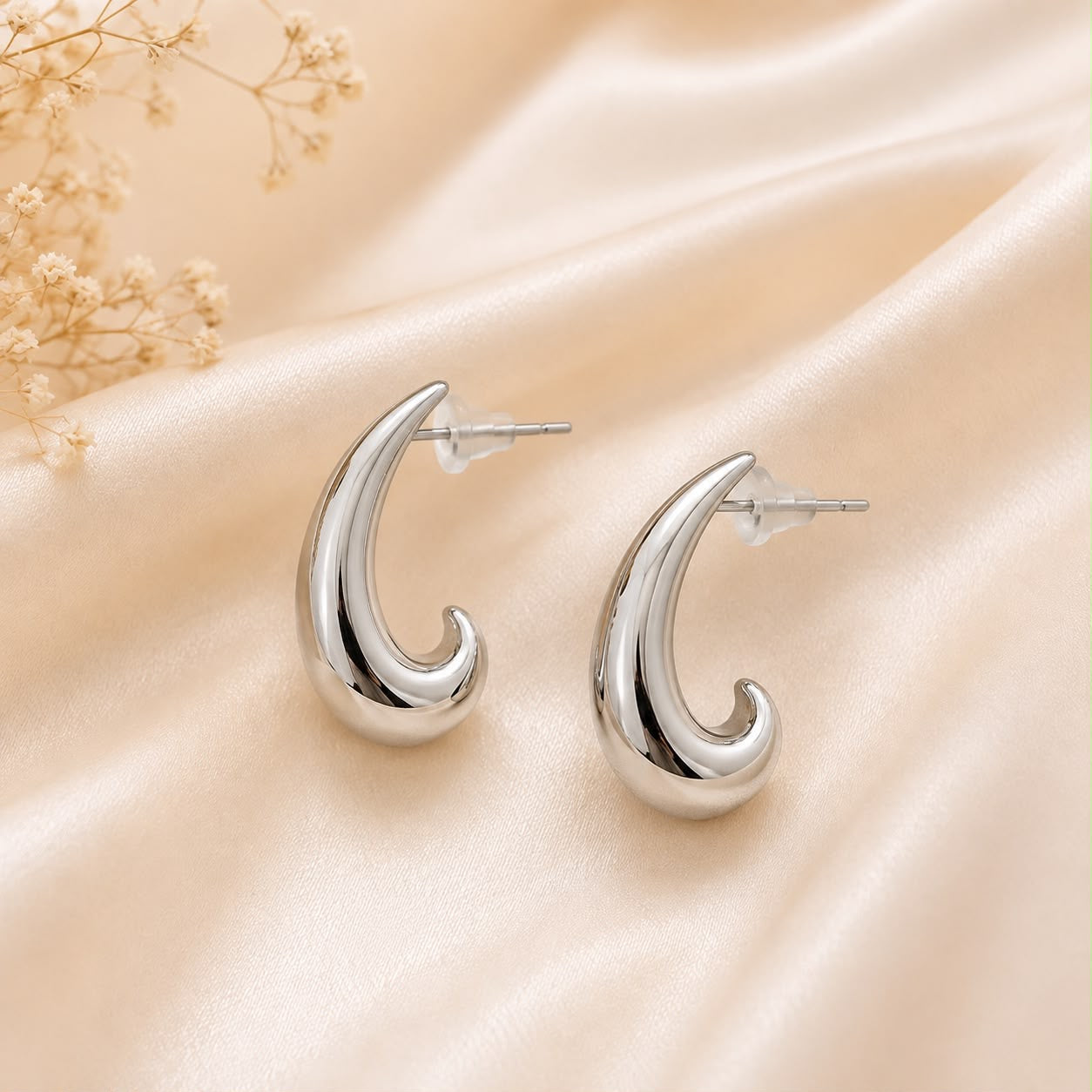 Aretes gota curva plateados