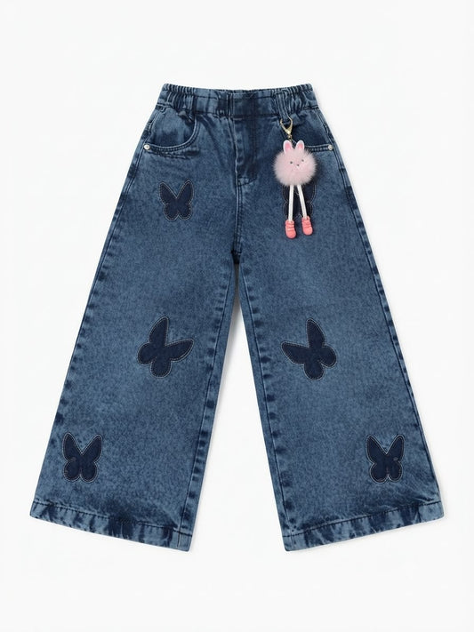 Pantalón niña de mezclilla wide leg con mariposas