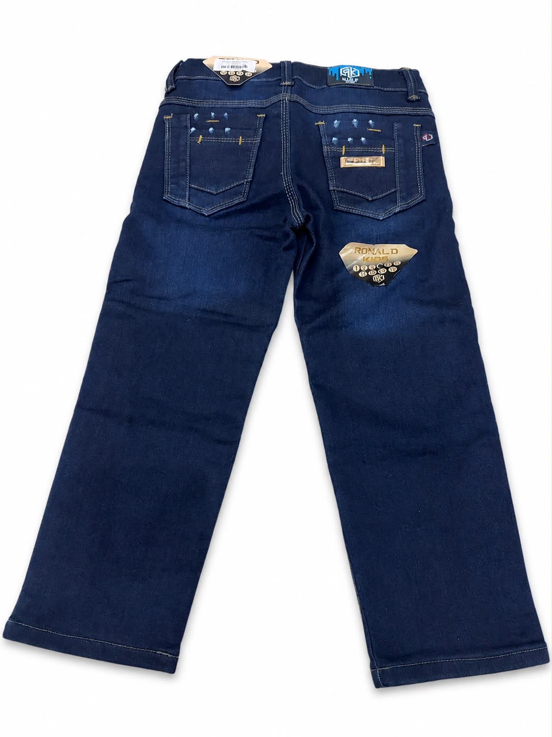 Pantalón niño mezclilla azul oscuro con detalles decorativos