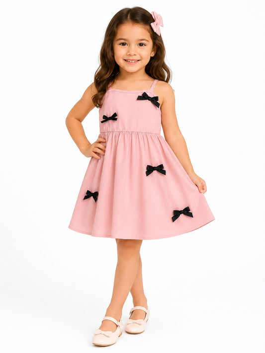 Vestido niña rosa con moños negros