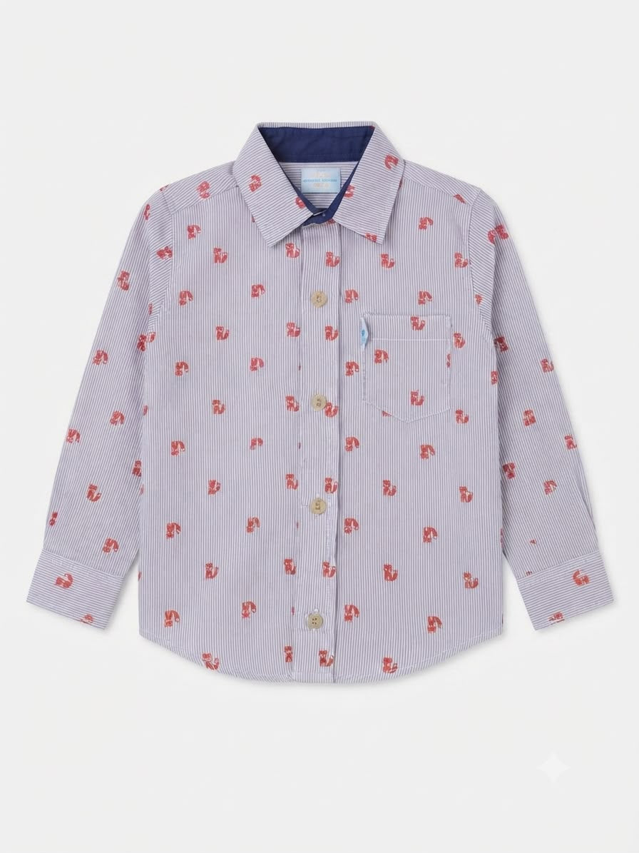 Camisa niño de manga larga con estampado y bolsillo