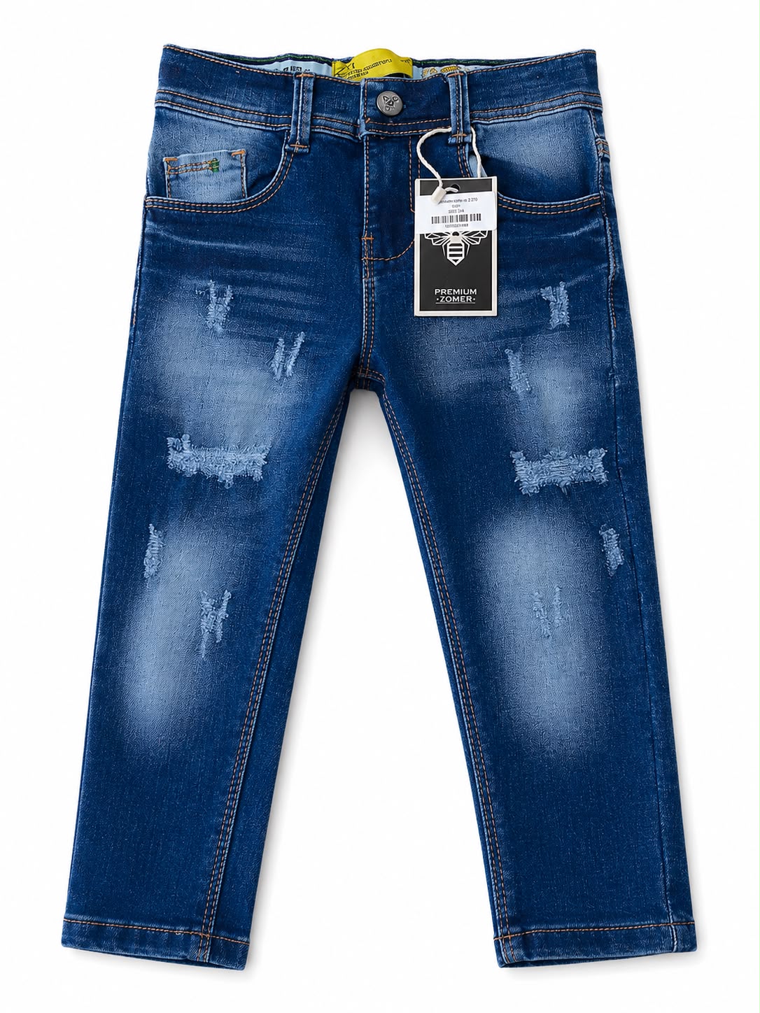 Pantalón niño mezclilla azul con roturas y efecto deslavado