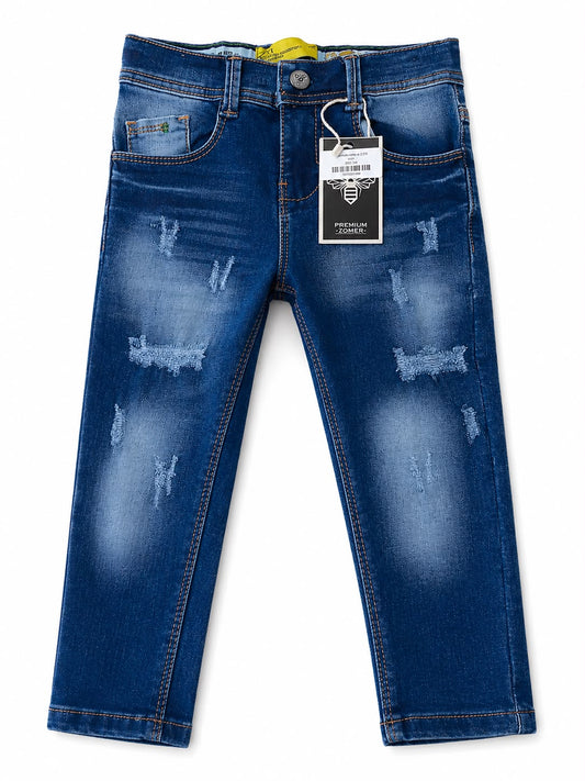 Pantalón niño mezclilla azul con roturas y efecto deslavado