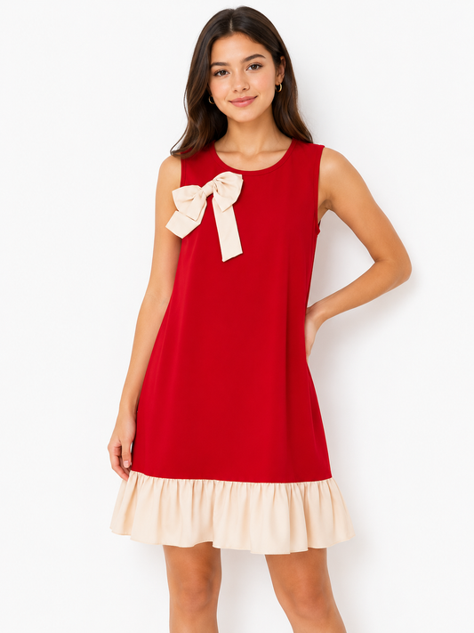 Vestido niña sin mangas con moño decorativo y olan en contraste