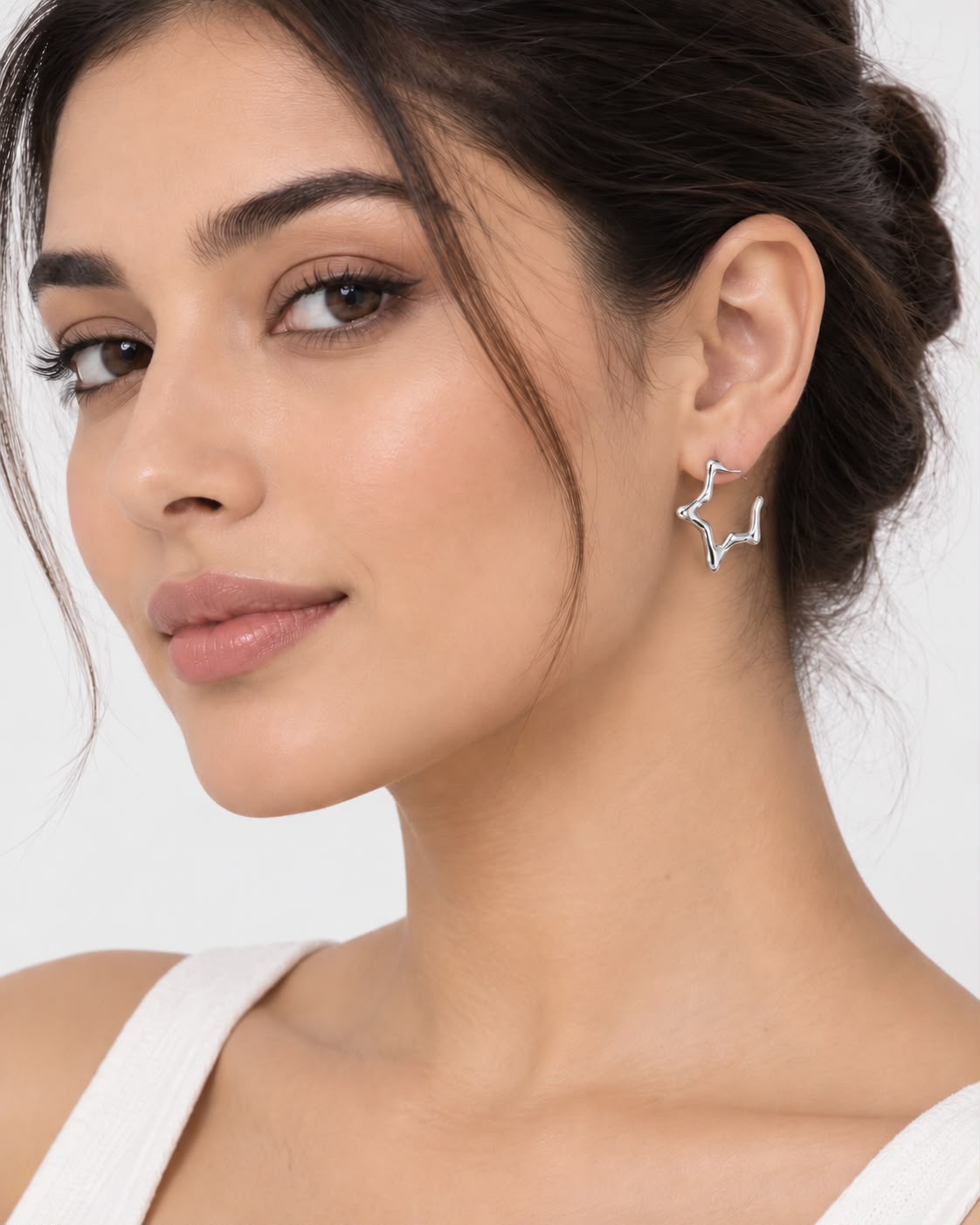 Aretes dama estrella plateada