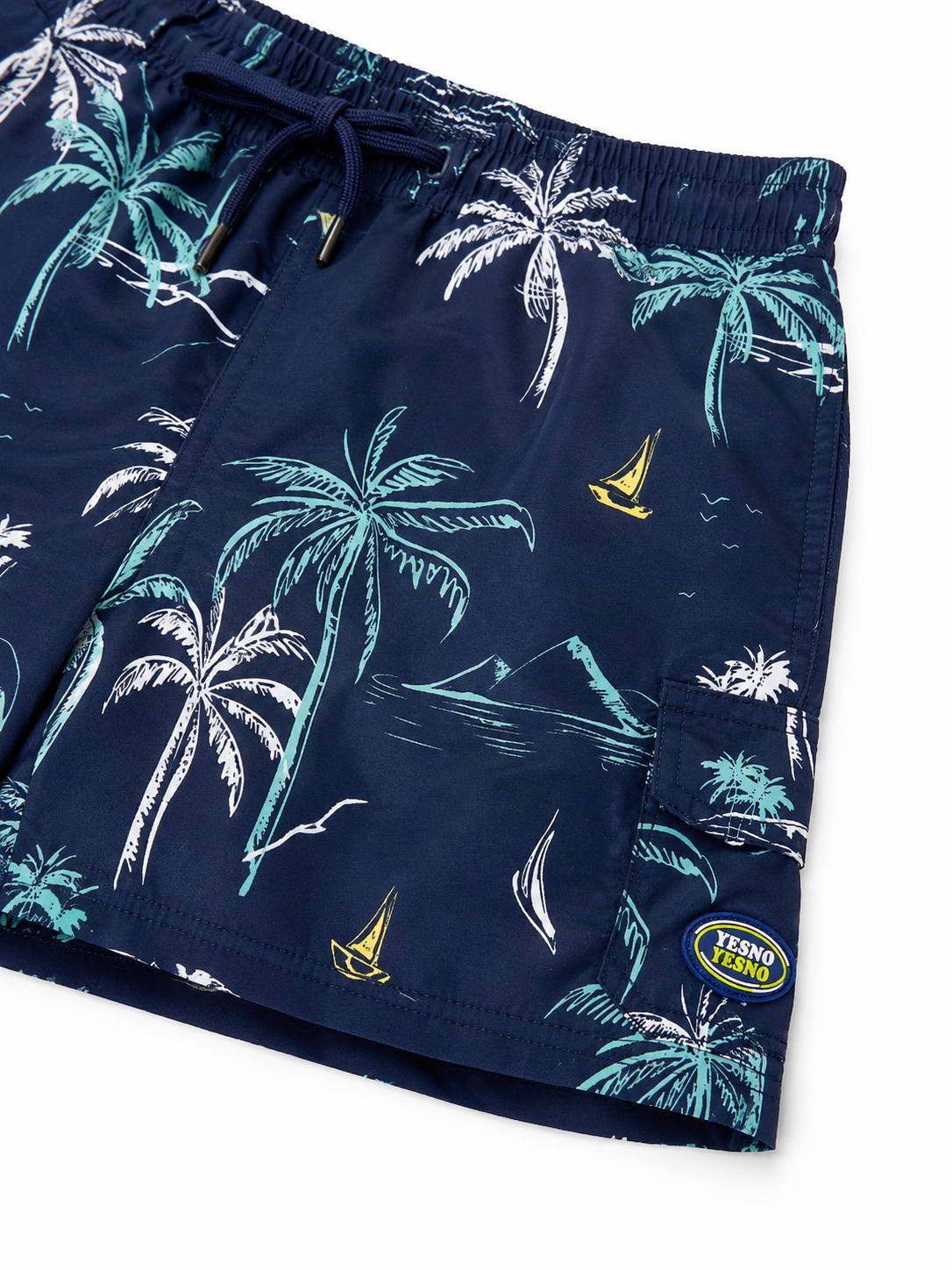Short niño tipo playero con estampado tropical 🌴🌊