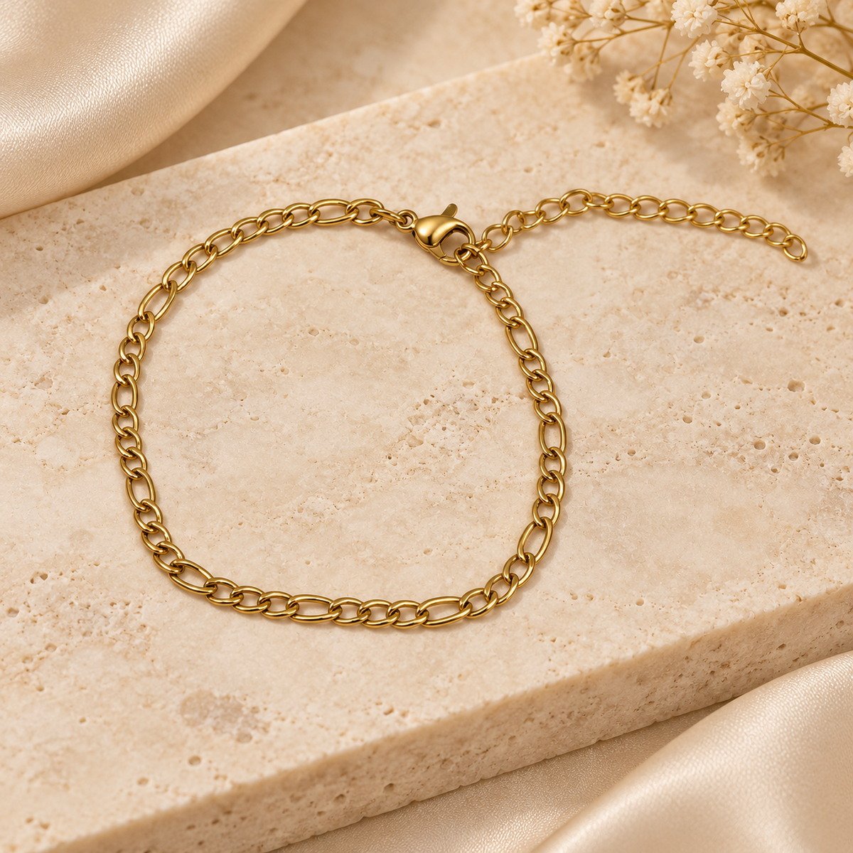 Pulsera dama dorada de eslabones ovalados entrelazados