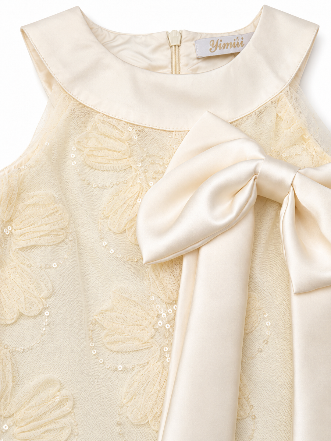 Vestido niña marfil con encaje floral, lentejuelas y moño satinado