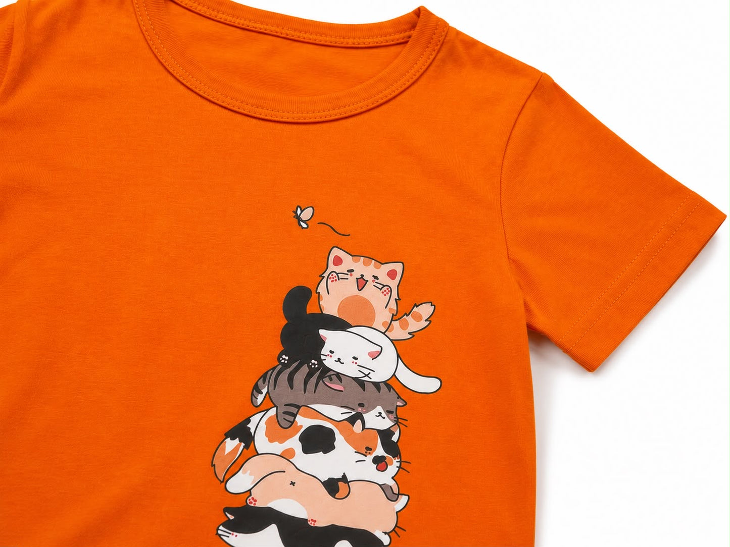 Blusa niña naranja con estampado de gatitos
