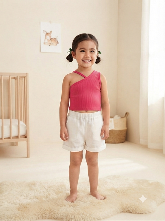 Blusa niña rosa fucsia de un hombro