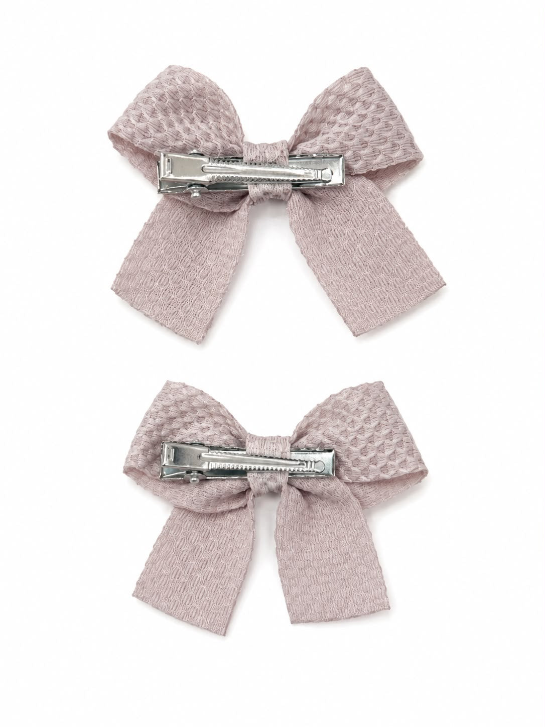 Moño par niña beige texturizado