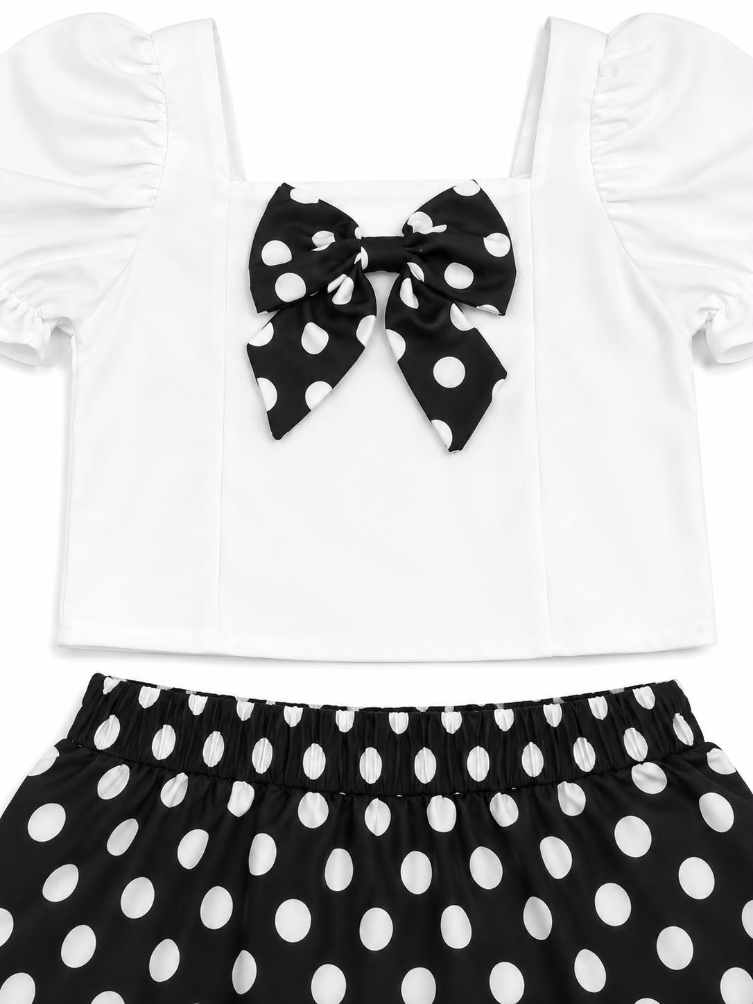 Set niña blusa blanca con moño y falda de lunares