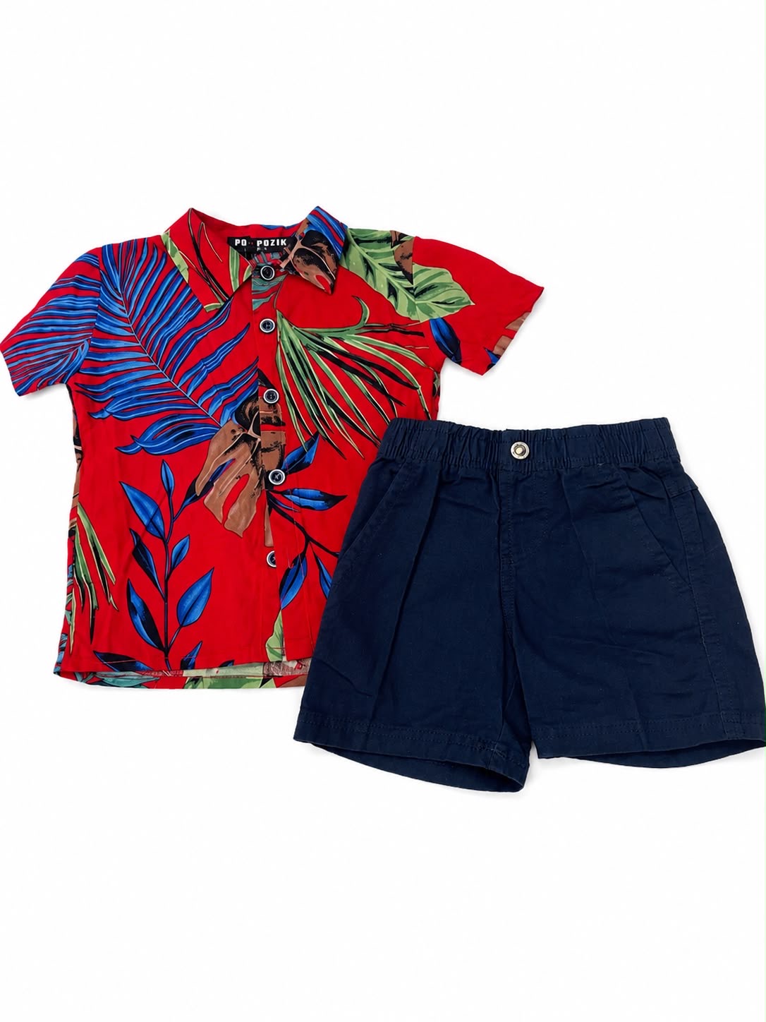 Set niño camisa tropical roja con short azul marino