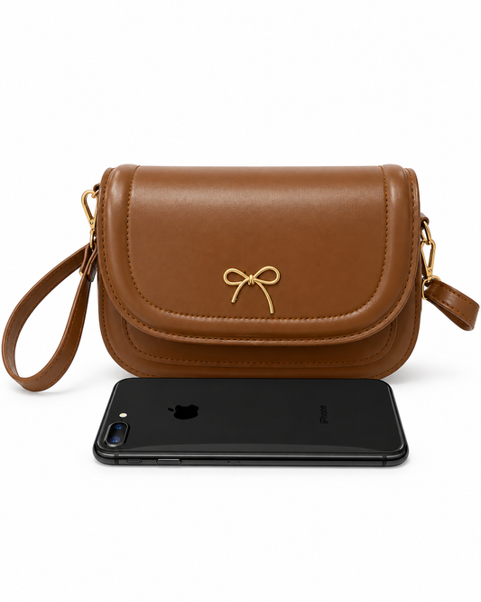 Bolsa dama con detalle de moñito y correa ajustable