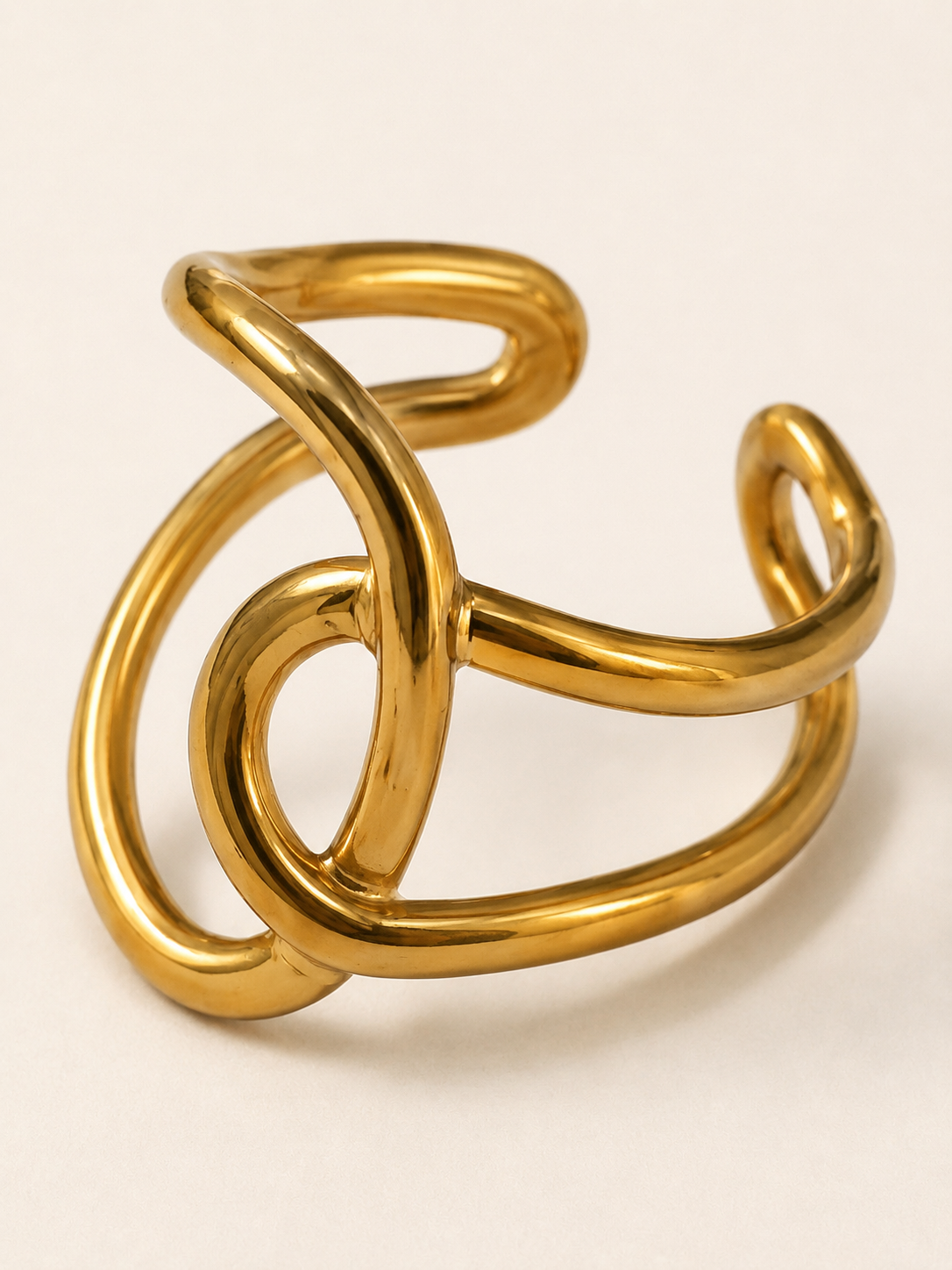 Anillo dama dorado diseño entrelazado ✨