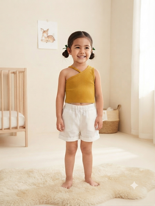 Blusa niña mostaza de un hombro