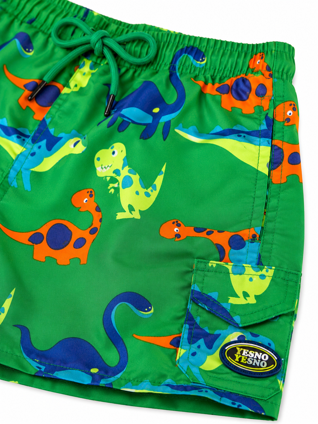 Short niño tipo playero con estampado de dinosaurios 🦕💚