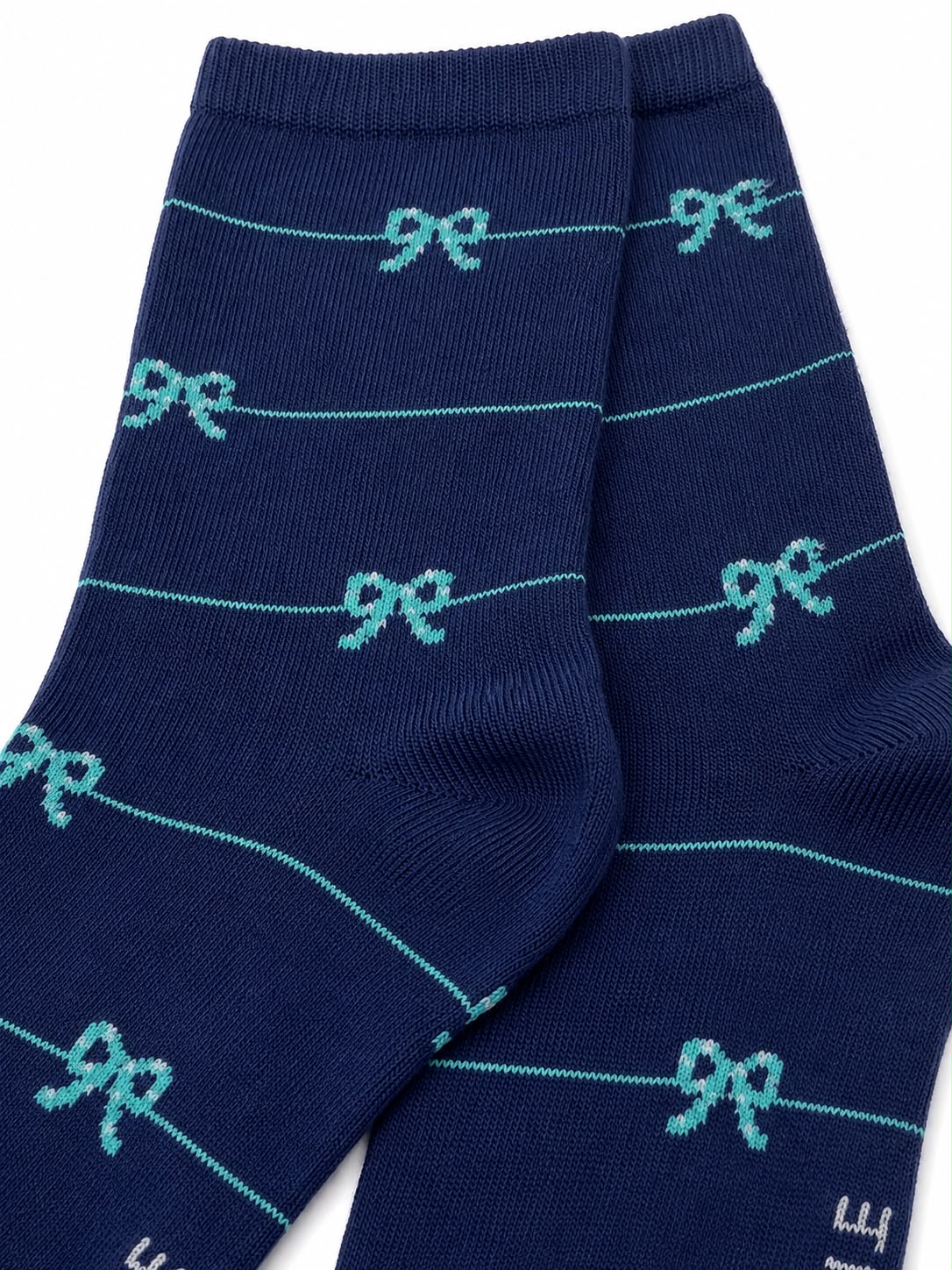 Calcetas largas azul marino con moños