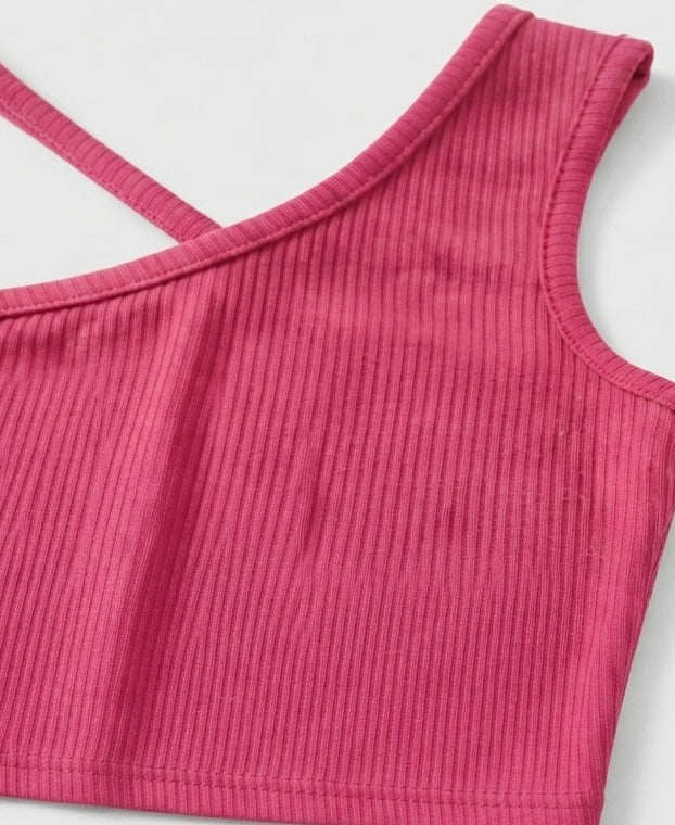 Blusa niña rosa fucsia de un hombro