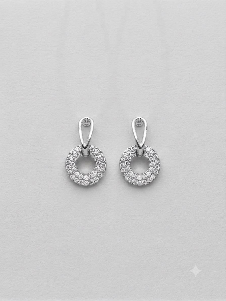 Aretes plateados con cristales circulares