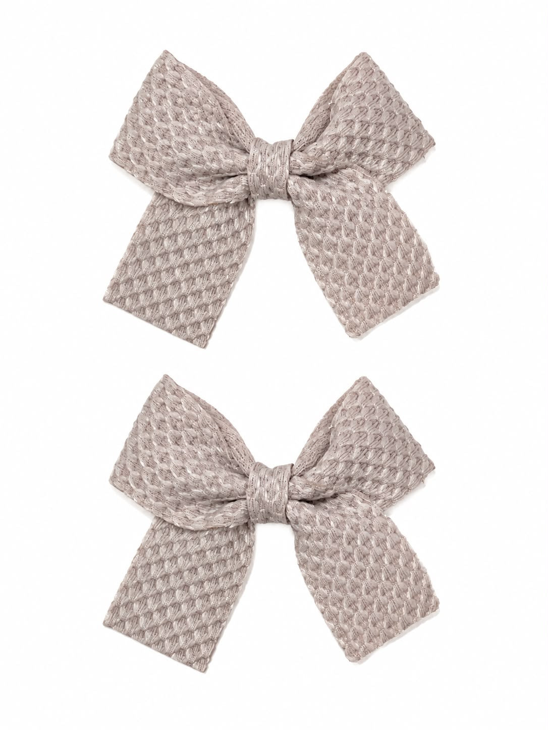 Moño par niña beige texturizado