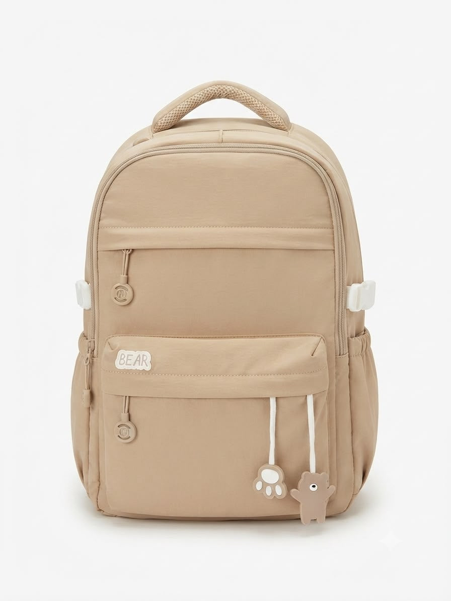Mochila juvenil beige con detalles de osito 🎒🤎