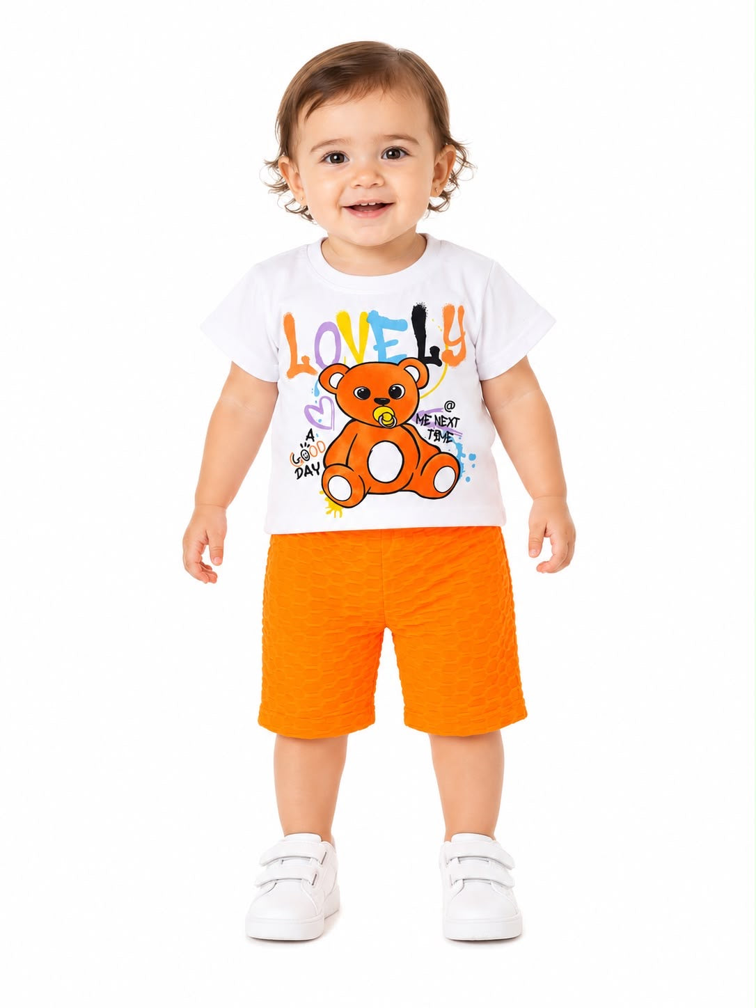 Set niña playera con estampado y short naranja