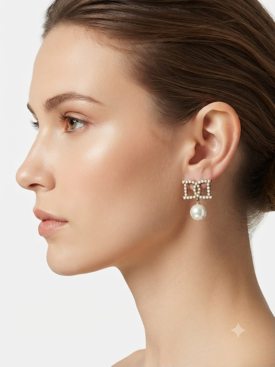 Aretes con perla y detalle de perlas