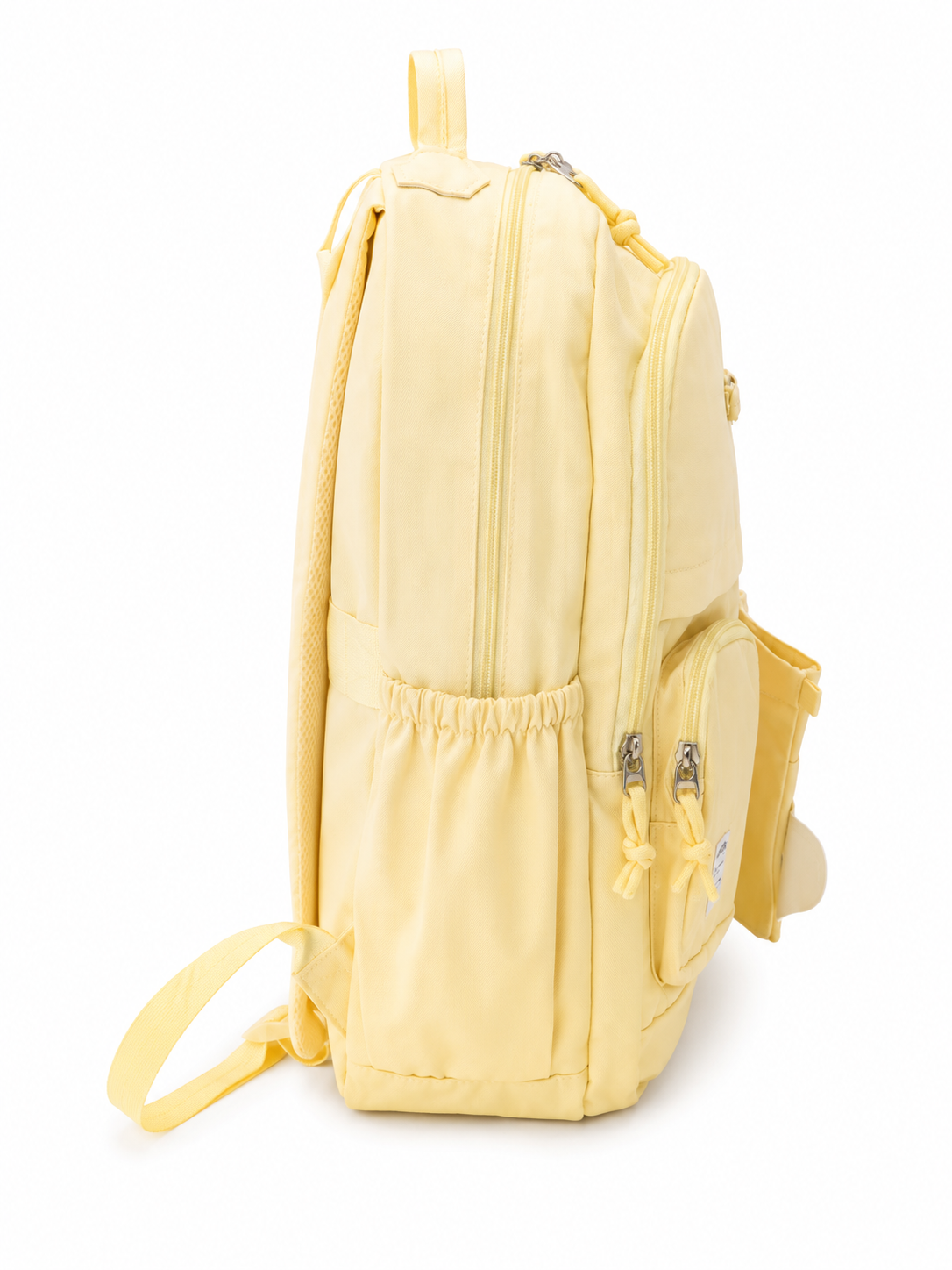 Mochila juvenil color amarillo pastel con diseño de perrito