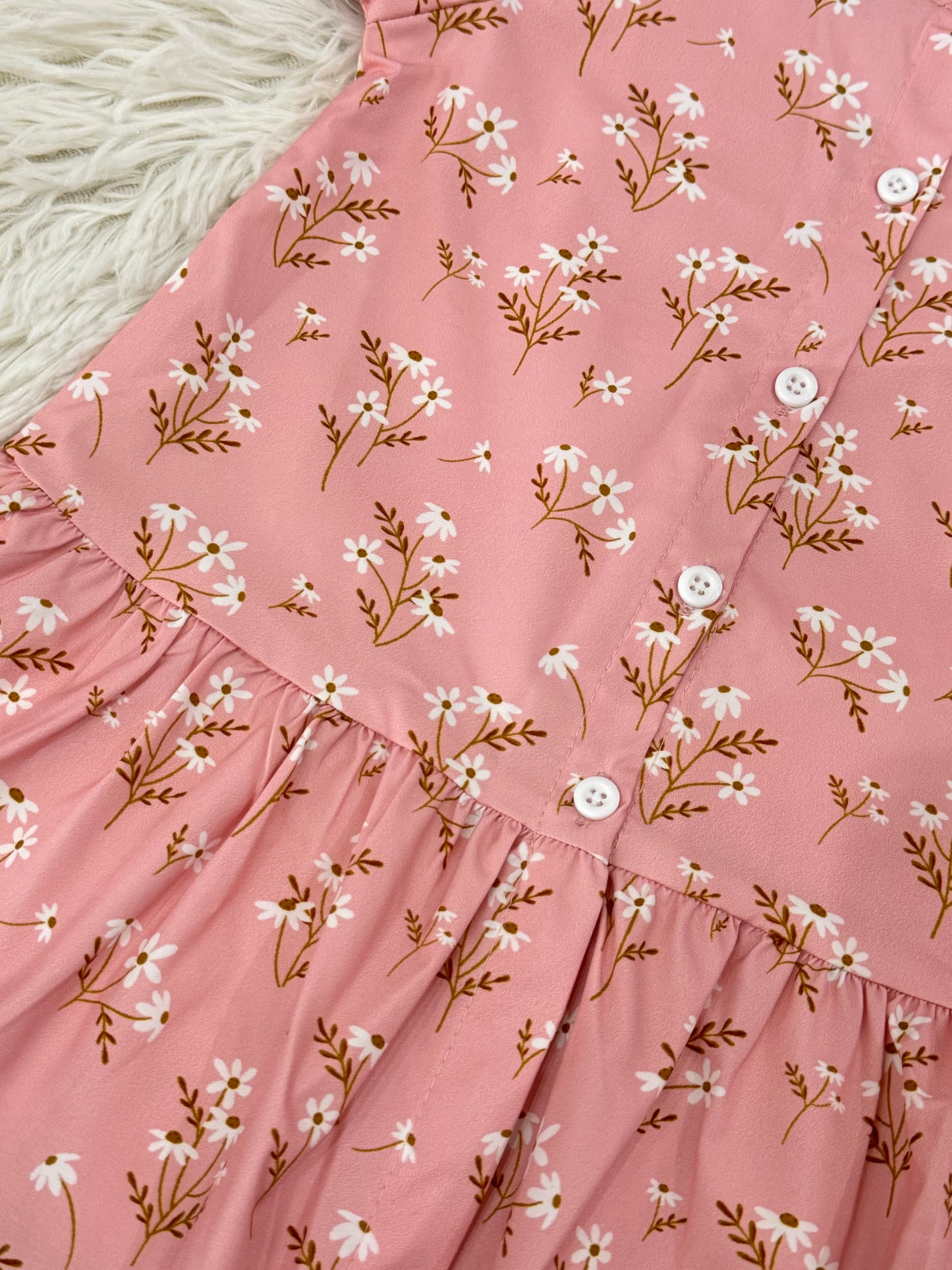 Vestido niña rosa con estampado floral y manga larga