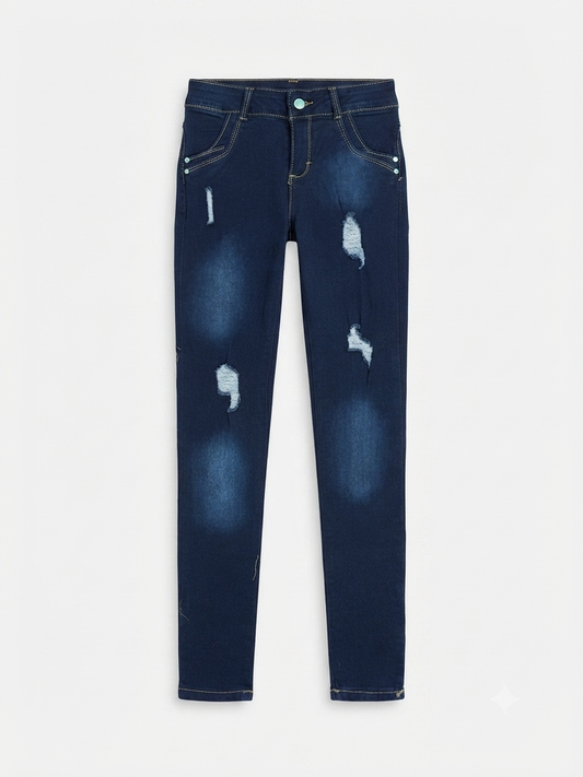 Pantalón niña skinny mezclilla azul con detalles desgastados